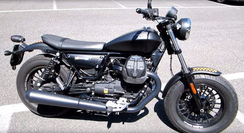 Rear view of the Moto Guzzi V9 Bobber highlighting its exhaust system and tail design