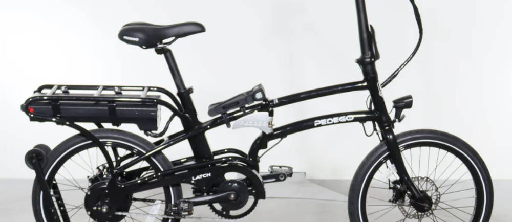 a black Pedego Latch electric folding bike