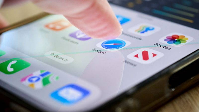 The Apple Safari app on a smartphone arranged in Germantown, New York, US, on Wednesday, May 7, 2025. Apple Inc. is %22actively looking at%22 revamping the Safari web browser on its devices to focus on AI-powered search engines, a seismic shift for the in