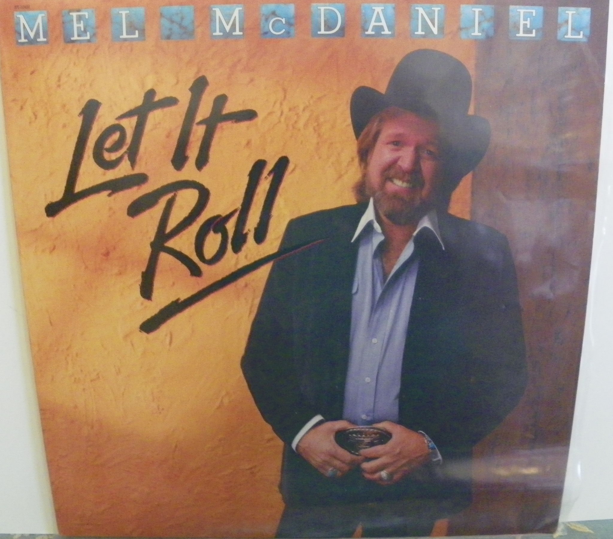 MEL MCDANIELS - LET IT ROLL