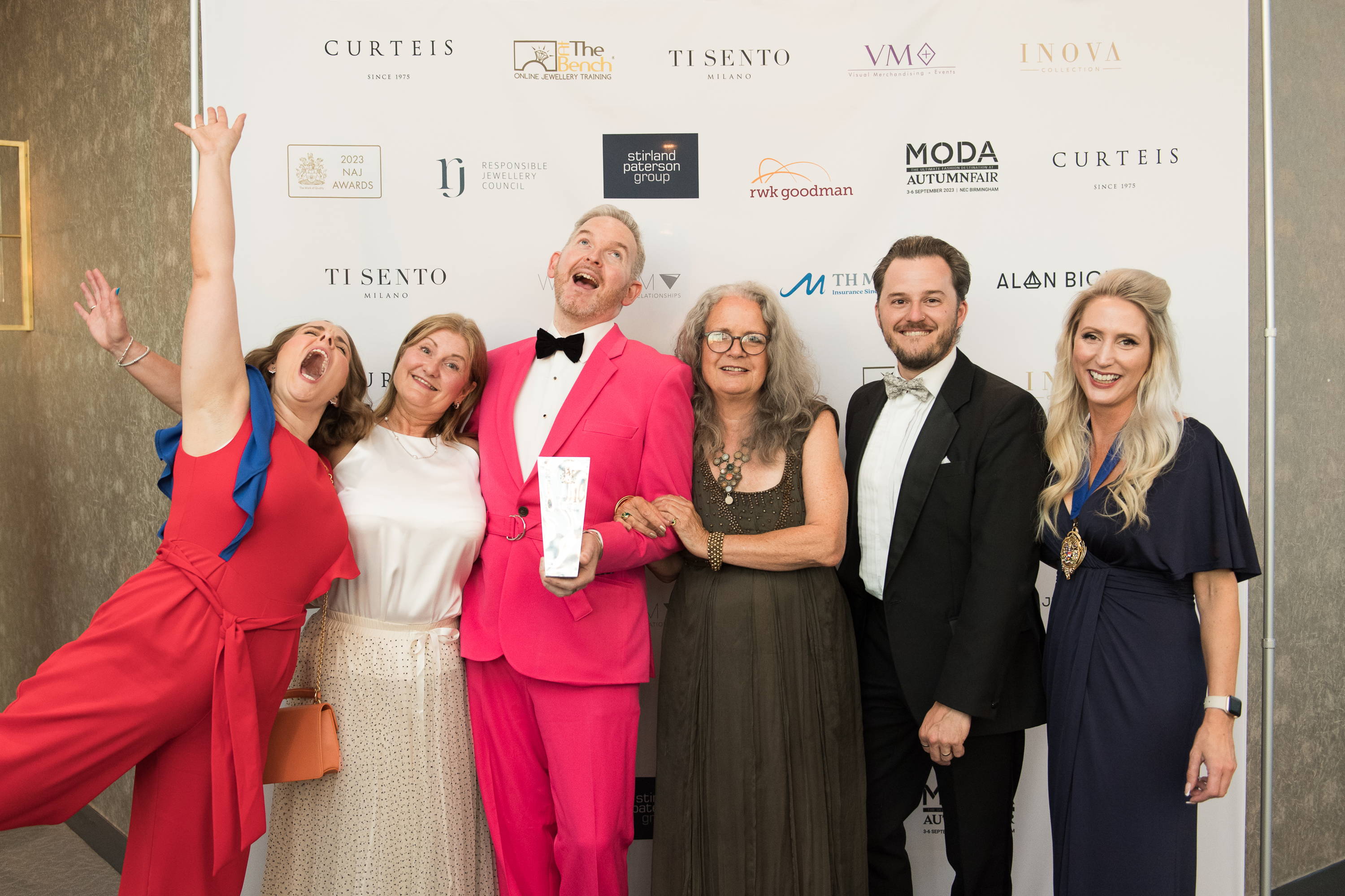 The Flinn & Steel team are presented with a trophy on stage at the UK Jewellery Awards in London's Hilton Metropole.