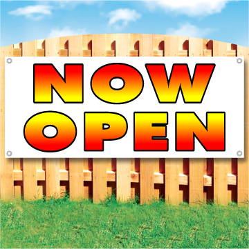 Wood fence displaying a banner saying 'Now Open' in red and yellow text on a white background