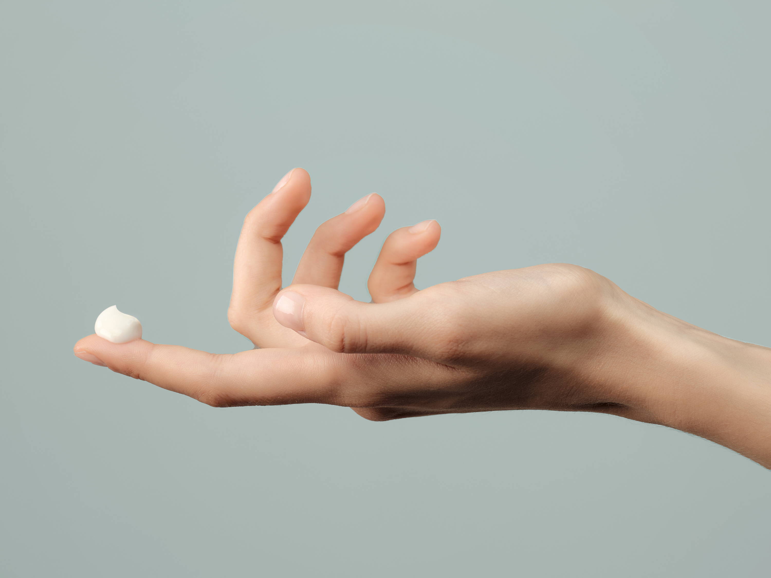 Woman's hand with moisturizer