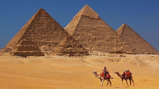 Camel ride at the Great Pyramids at Giza, Egypt