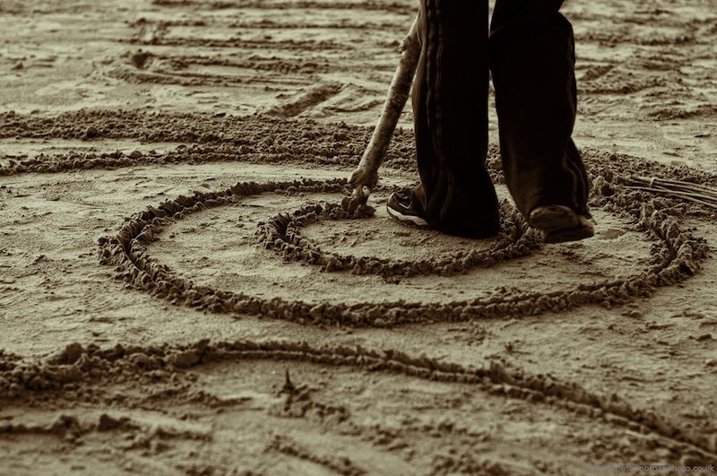lines drawn in the sand by a small child