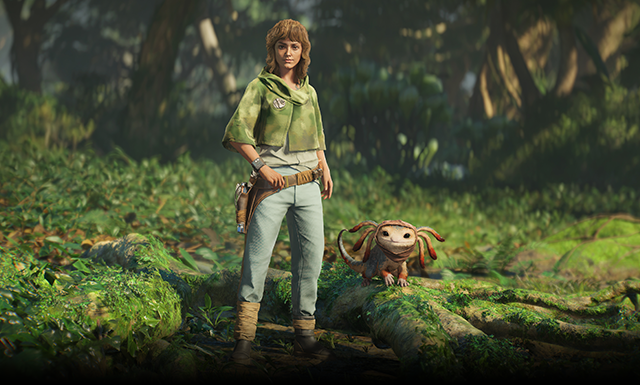 A character, Kay Vess, from the video game "Star Wars Outlaws" stands in a lush forest setting accompanied by a small, her adorable axolotl-inspired Merqaal companion Nix. The character wears an adventurer's outfit.