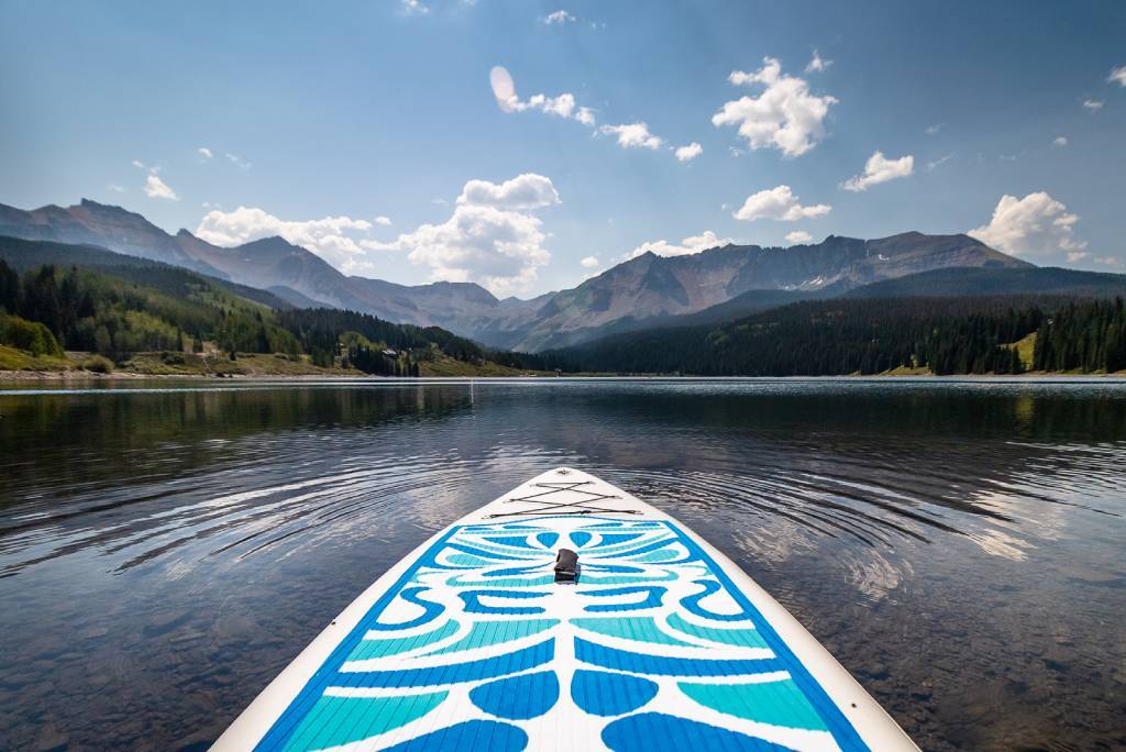 stand up paddleboarding in Canada with UPF shirt