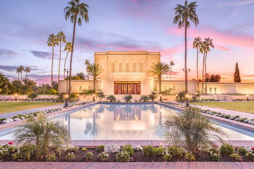Mesa Temple reflection pool reflecting a blue and pink sky.