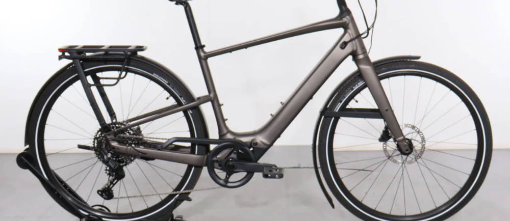 a silver Specialized Turbo Vado SL 2 4.0 EQ electric city bike