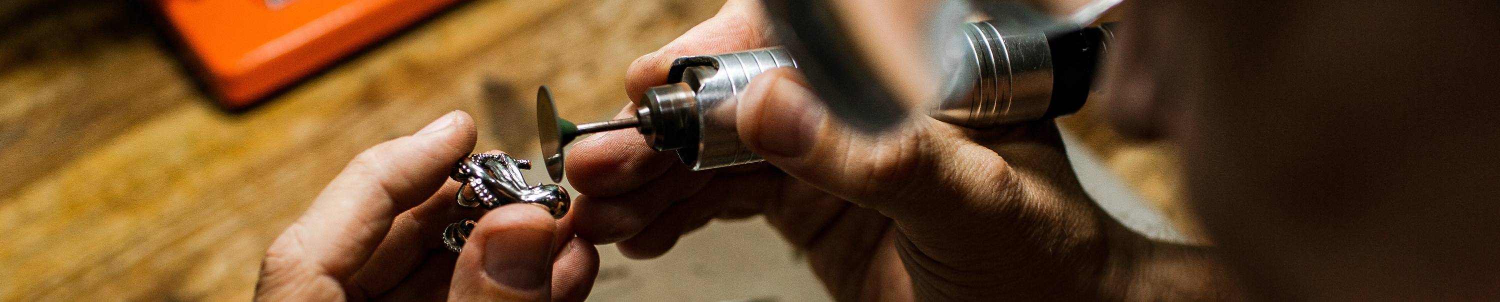 Jeweler working on jewelry piece