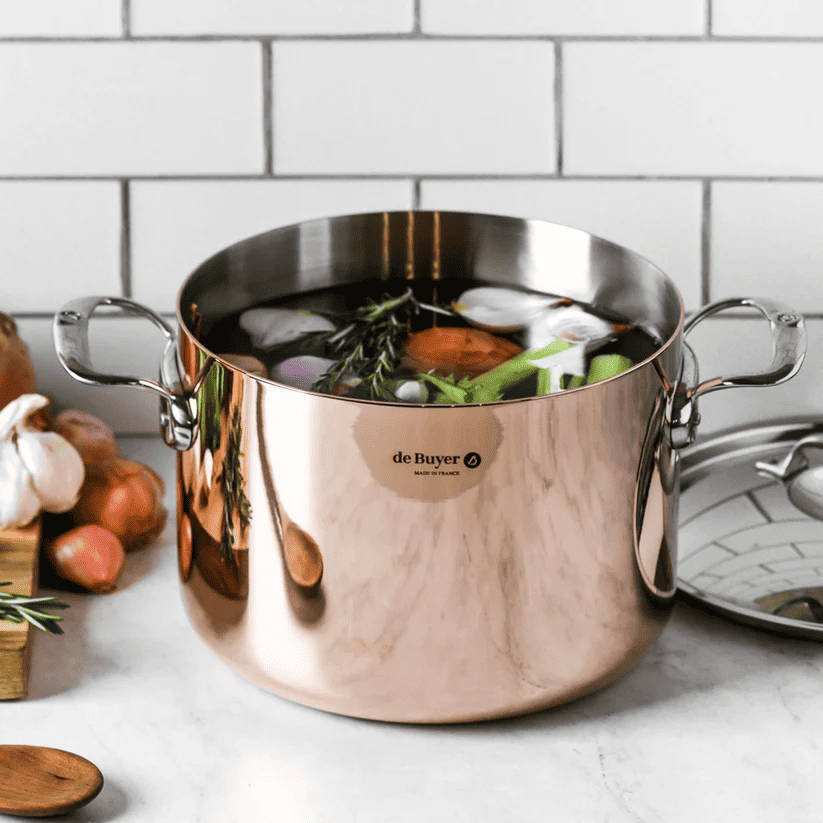 A large copper de Buyer stew pot  with vegetable inside