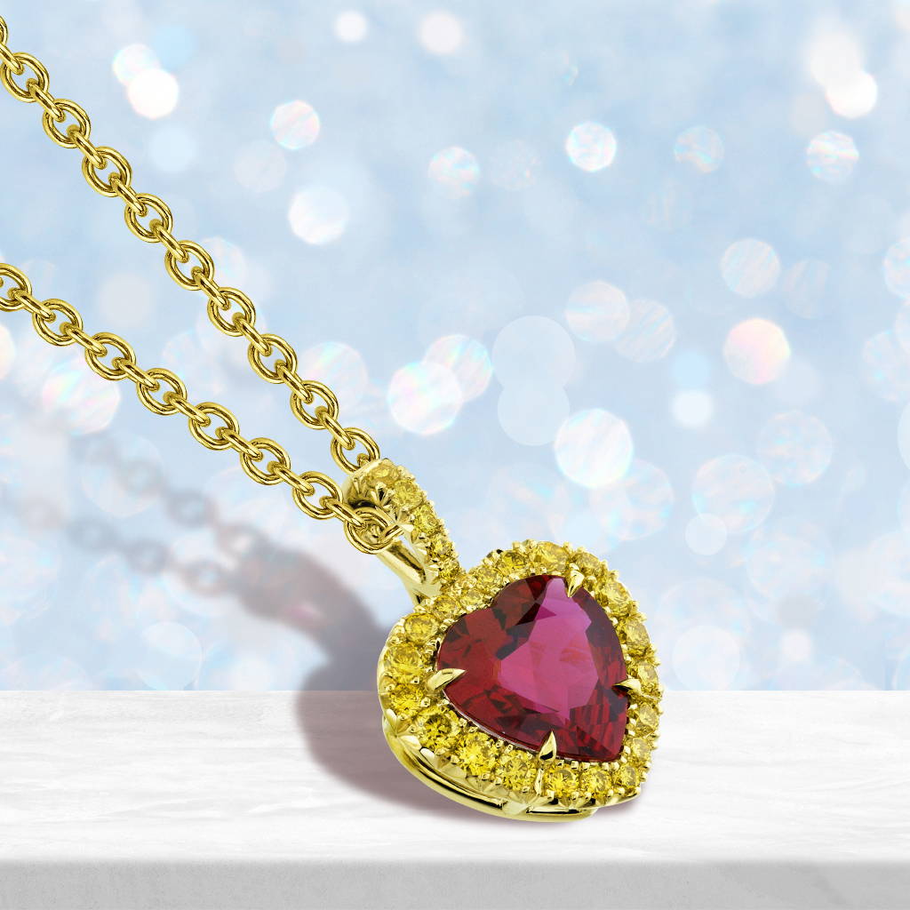 Heart shaped ruby with a yellow diamond halo