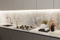 image of kitchen with undercabinets lit by LED strip lights, links to blog post about the basics of LED drivers