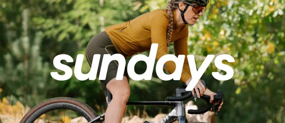 Sundays logo bicycle insurance and rider on bike