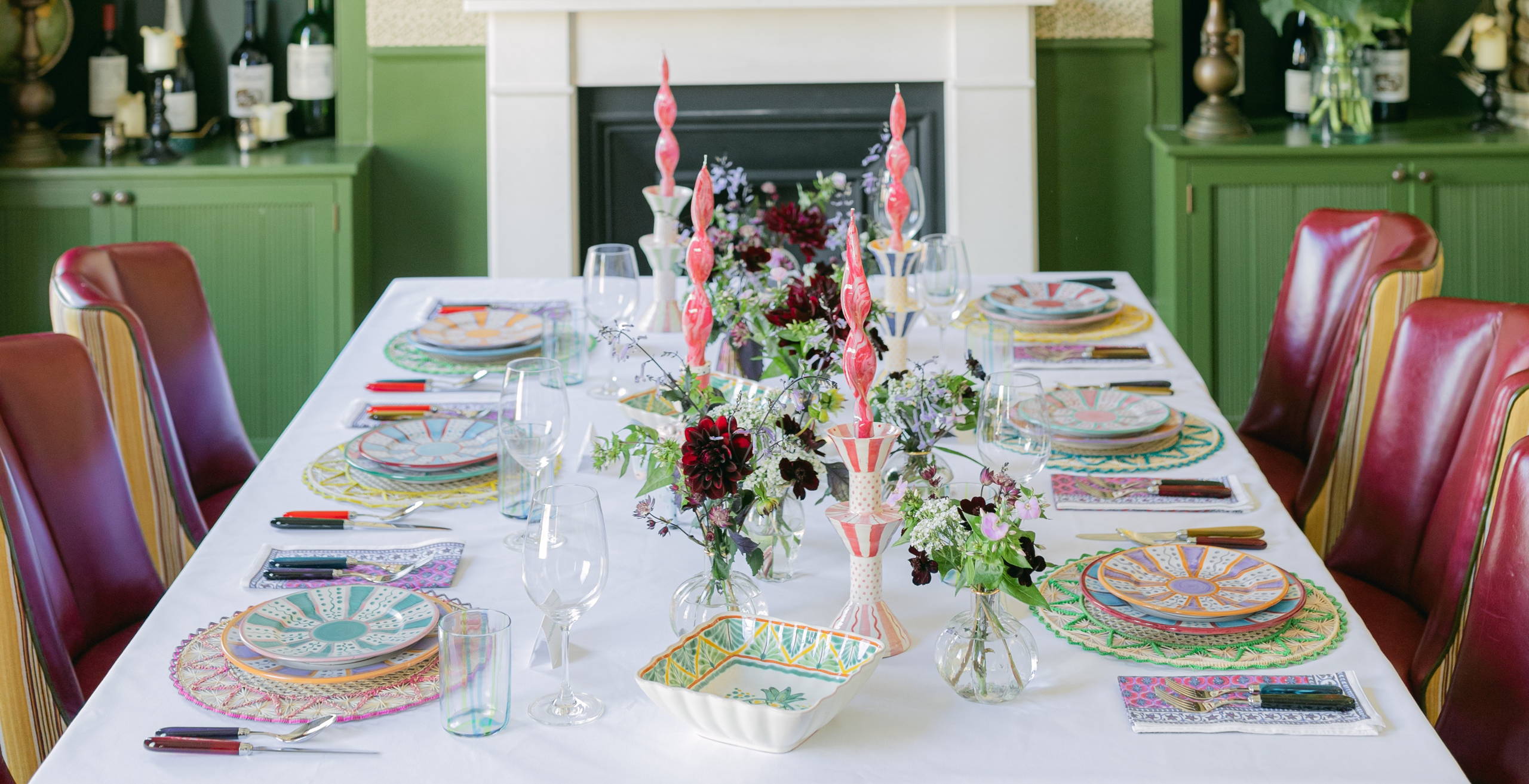 Bright fiesta themed tablescape with beatiful fresh flowers