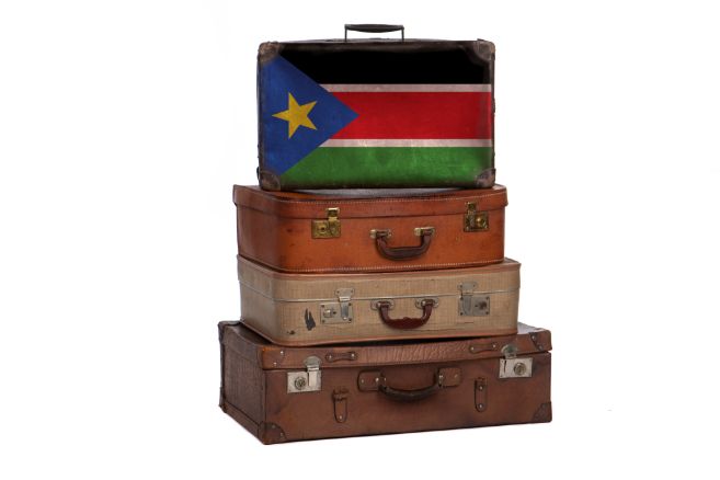 South Sudan travel concept. Group of vintage suitcases isolated on white background