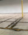 Graffiti removal from Stained Concrete Bike Path Grating