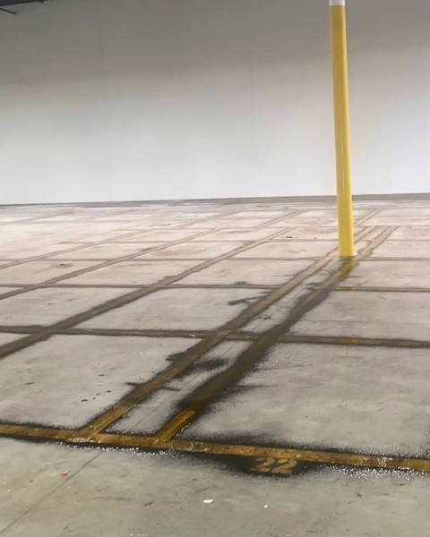 Graffiti removal from Stained Concrete Bike Path Grating