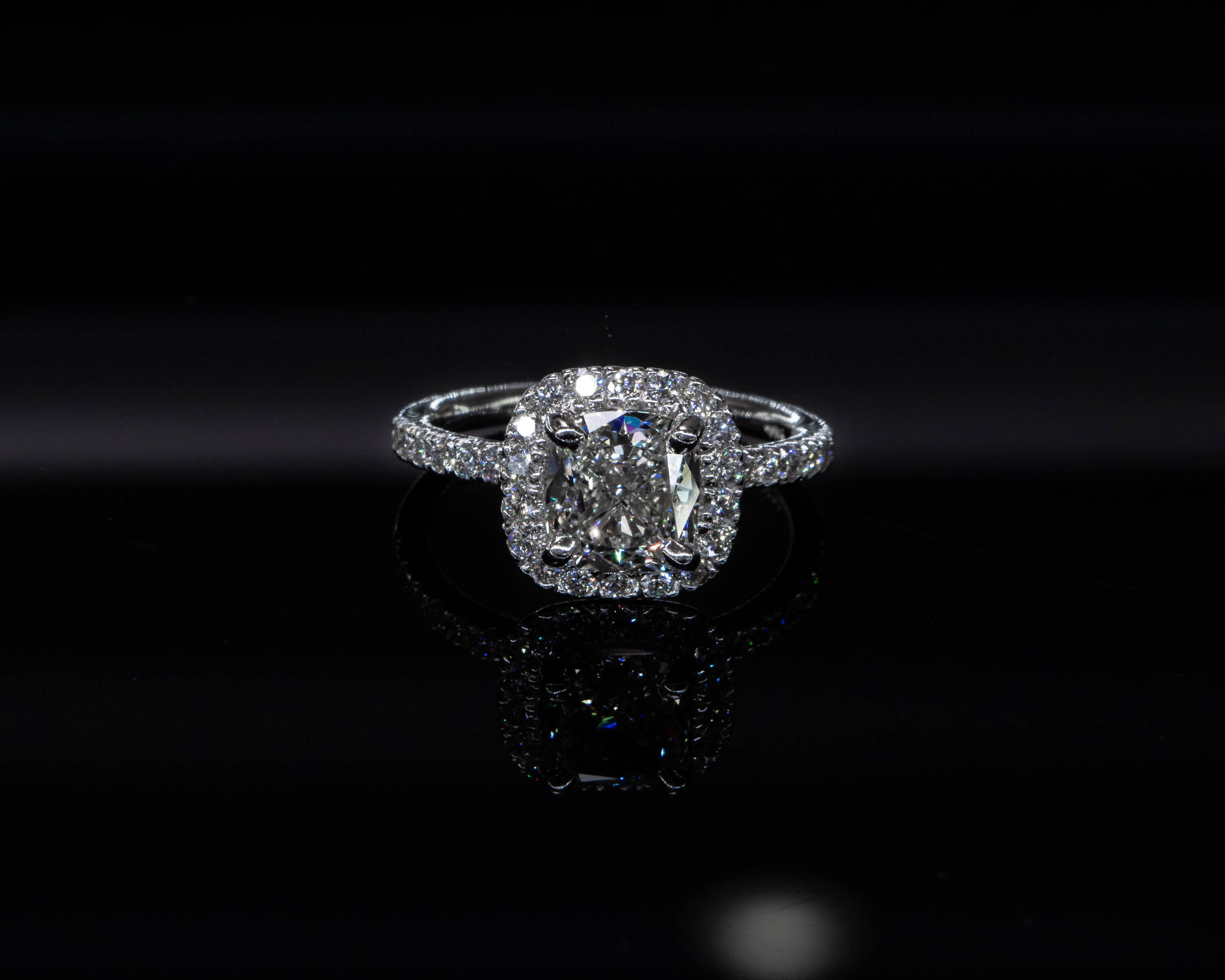 Cushion halo engagement ring