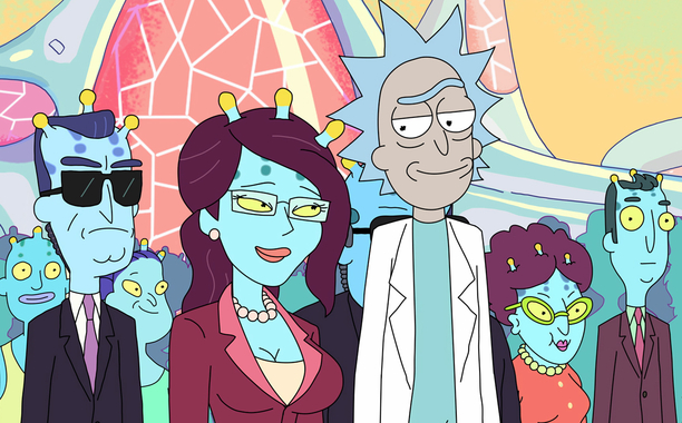 Image of Rick and UNITY smiling coyly at eachother among other aliens of UNITY's planet.
