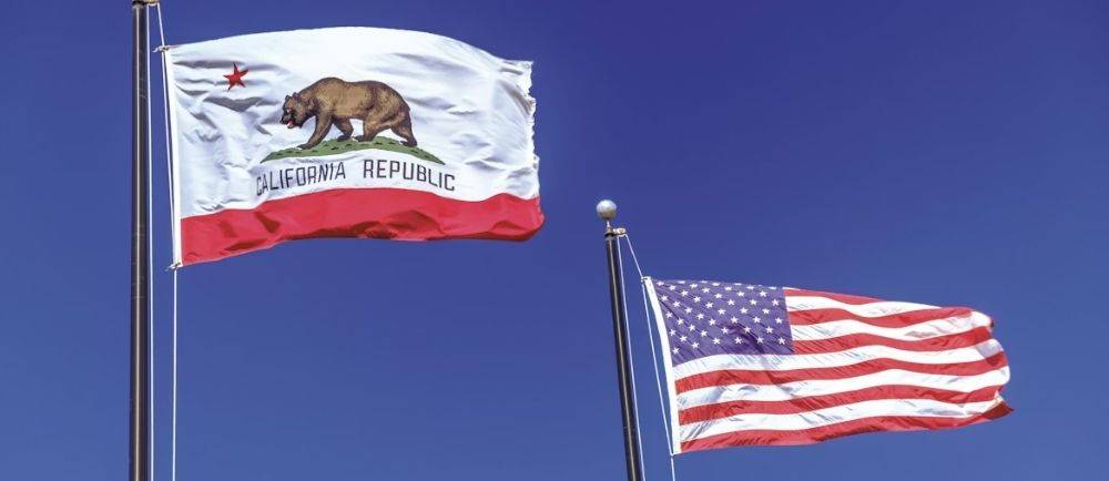 California and USA flags blowing in the wind
