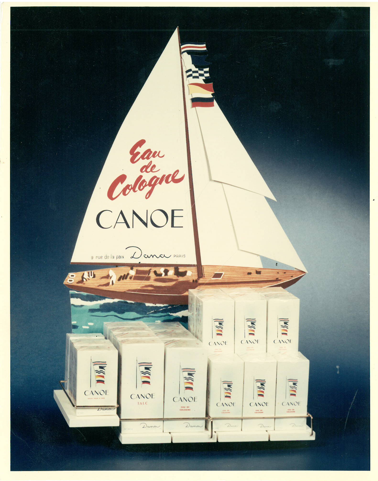 Vintage ad for Canoe eau de toilette with sailboat replica.