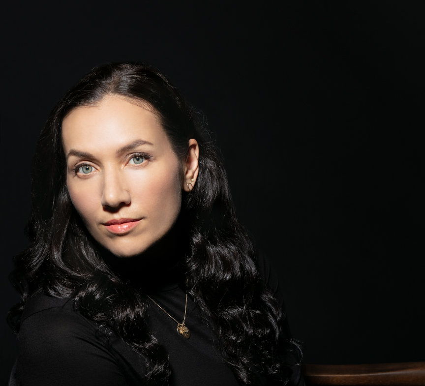 Headshot of Melissa Febos, leaning to the side.