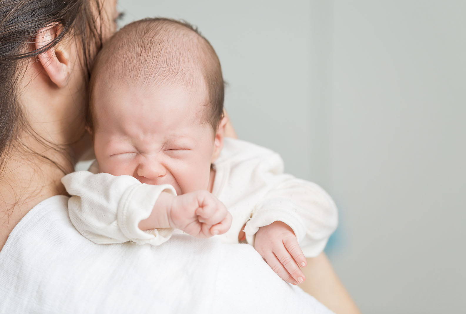 baby being held.