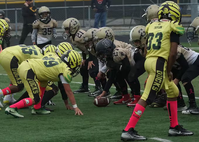 Ducks Football Pink Socks Team Photo