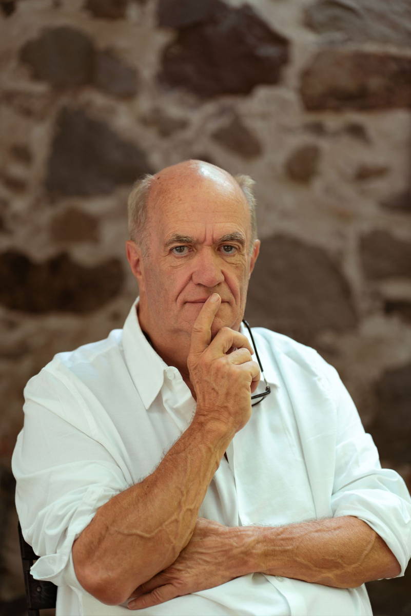 Colm Tóibín with his hand over his mouth.