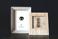 dog nose print displayed in frame next to photo of dog