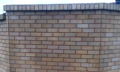 removing black spray paint from white brick