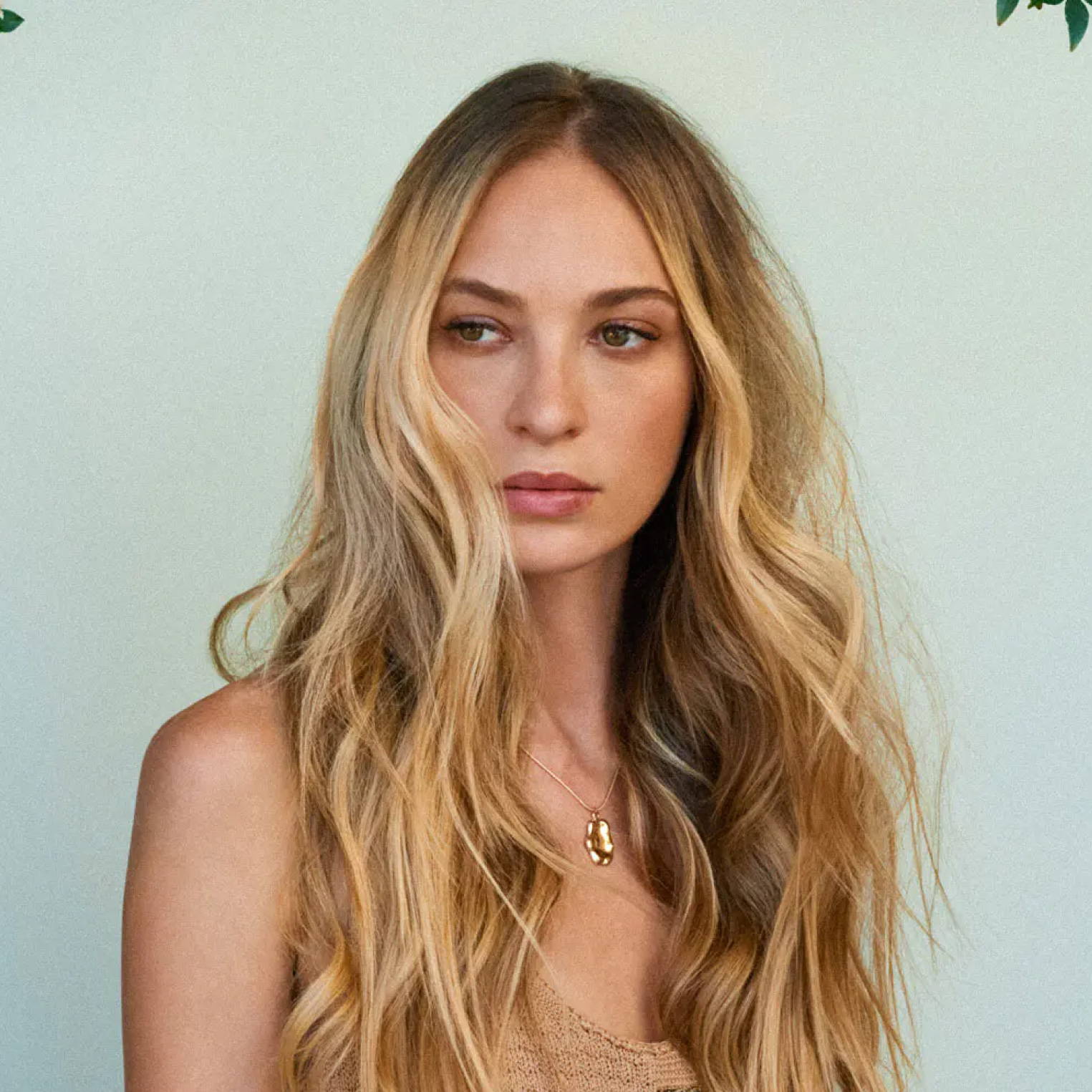 Blonde woman with shadow root hair