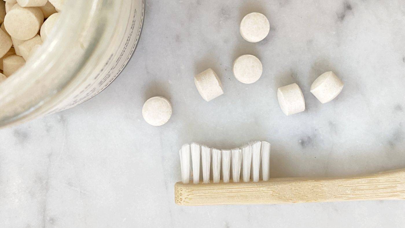 bamboo toothbrush and eco-friendly toothpaste bits