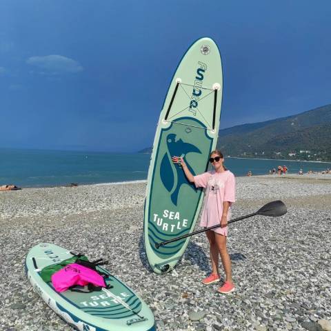 Customer stand up paddle board Quebec and paddling in the lake