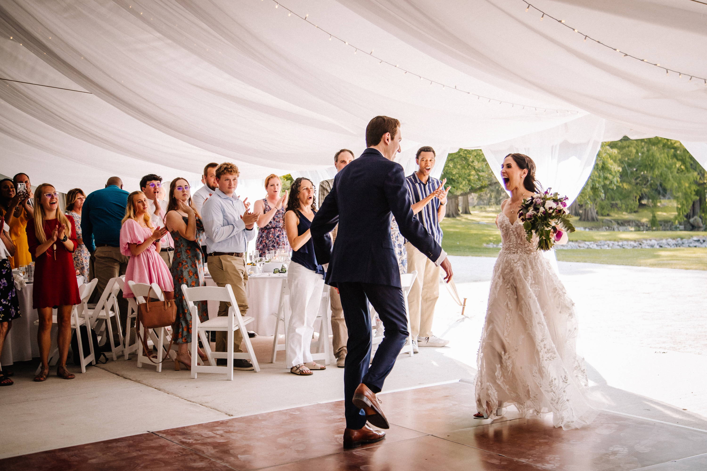 Tent, Tables, Chairs, Dance floor, Lighting all for your wedding.
