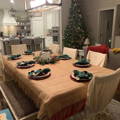 burlap tablecloth on a dining table in a house decorated for christmas