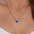 Sapphire & Diamond Pendant on woman