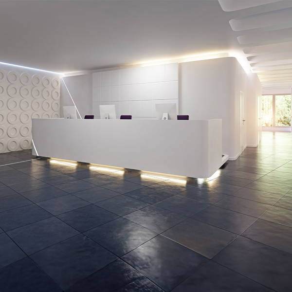 Toe kick lighting and cove lighting in reception desk
