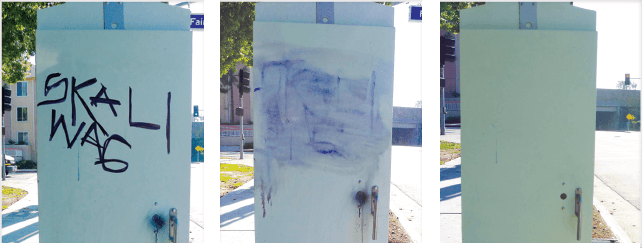 Feltpen removing ink stains from painted utility box
