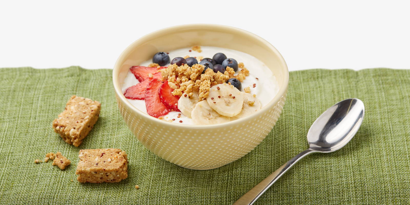 yogurt in a bowl with a ZENB bar