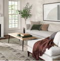 white and brown geometric wool rug
