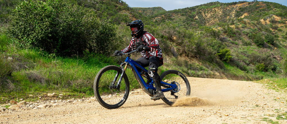 Mountain biker skidding a YT decoy