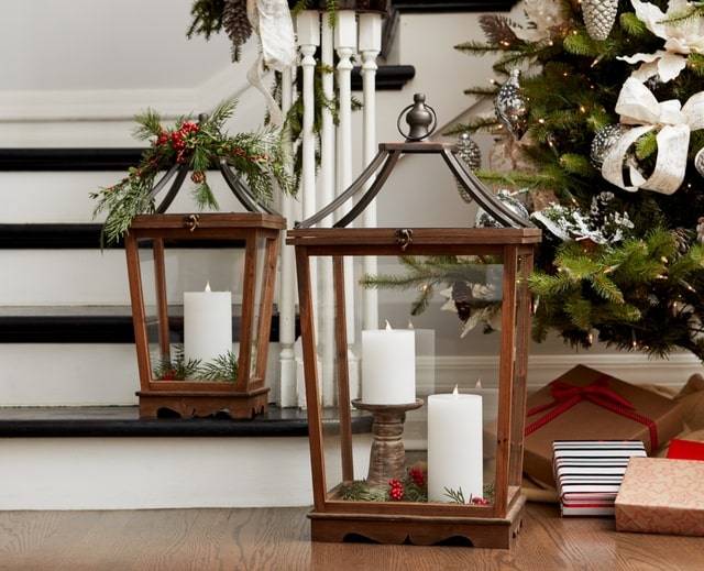 melrose wooden lantern with metal top and Christmas greenery