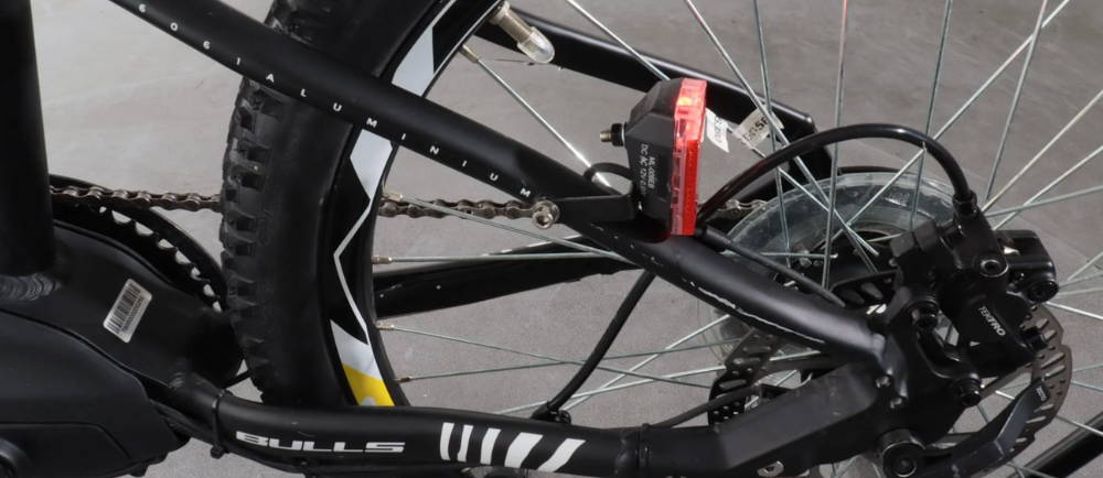 the rear wheel on a a Bulls Twenty4 E Zebra electric mountain bike for younger riders