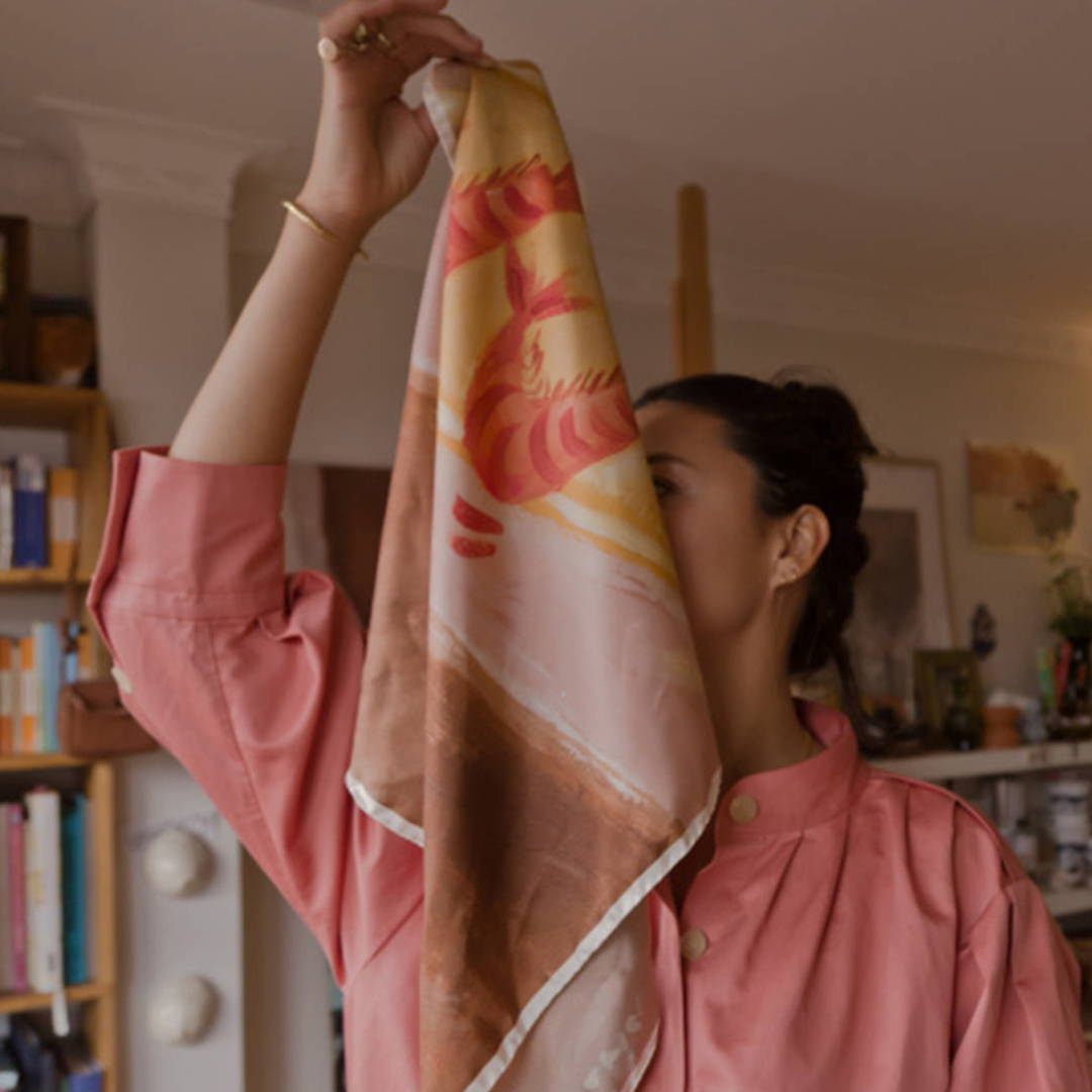 Lady holding scarf 