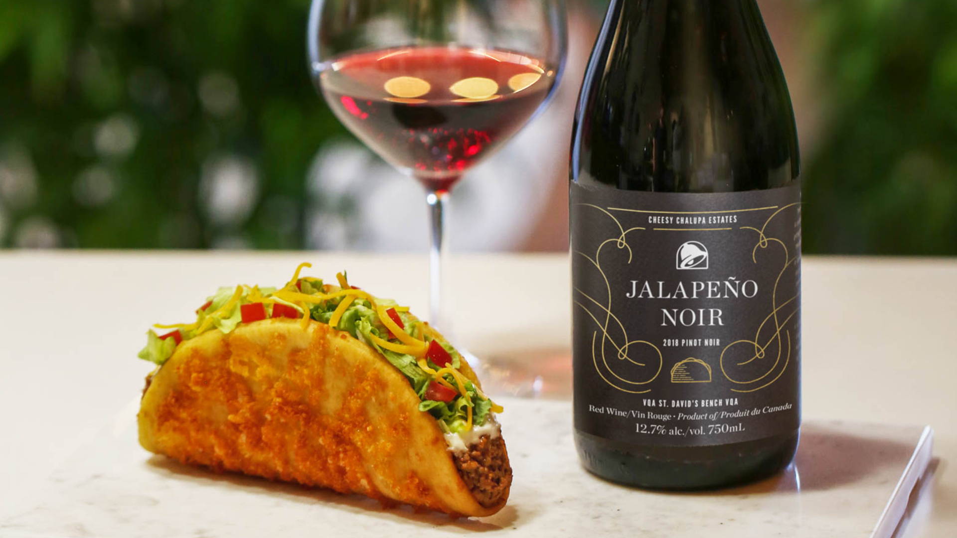Featured image for No One Was Asking For A Wine & Chalupa Pairing, But Taco Bell Made Jalapeño Noir Anyway