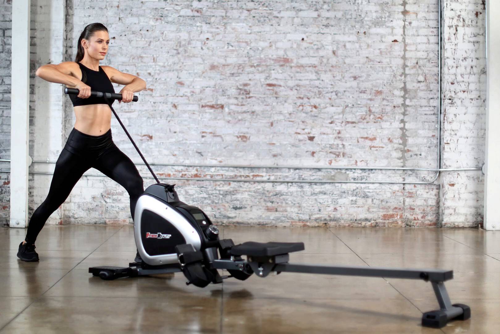 Women Prepearing for Using Rowing Machine