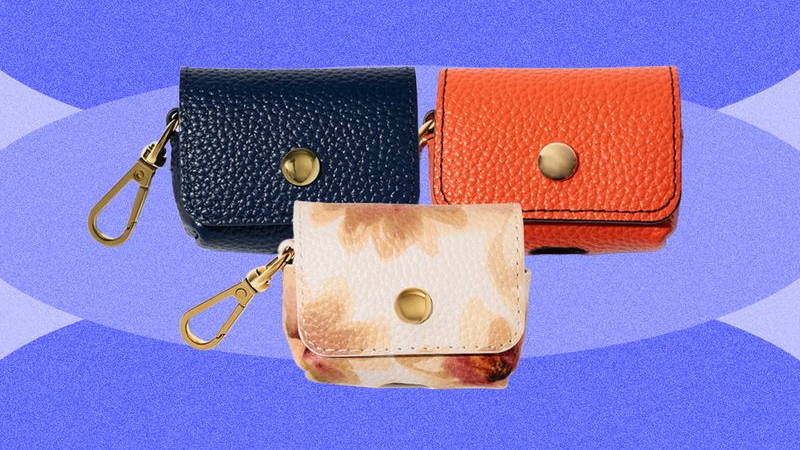 Three small pouches with gold snap to close and a gold keychain