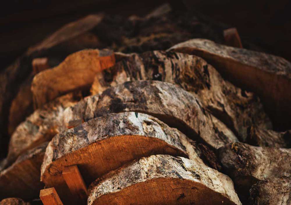 Stack of drying wood slabs